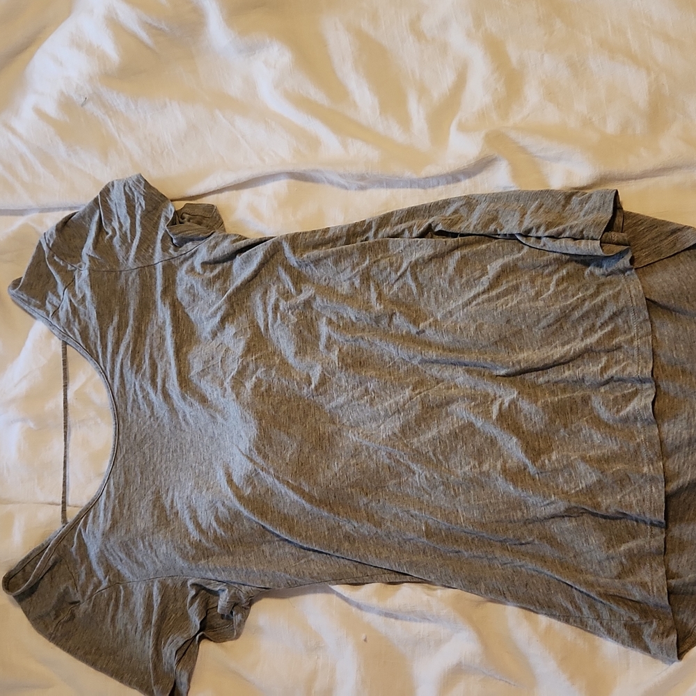 Women's shirt opens in back